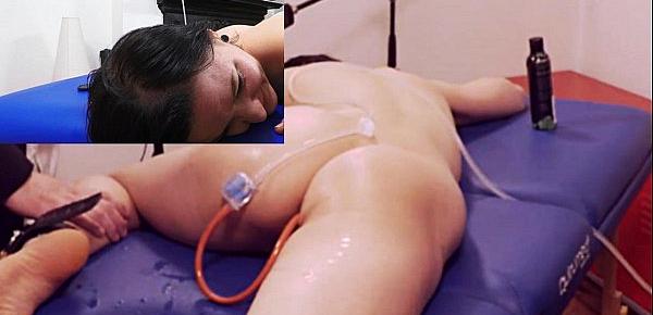  Miss April Takes a Painful Enema with a Series of Challenging Colon Tubes